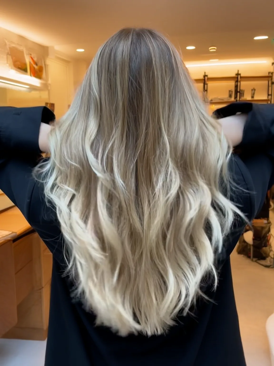 Long Wavy Ash Blonde Layers with Dark Roots